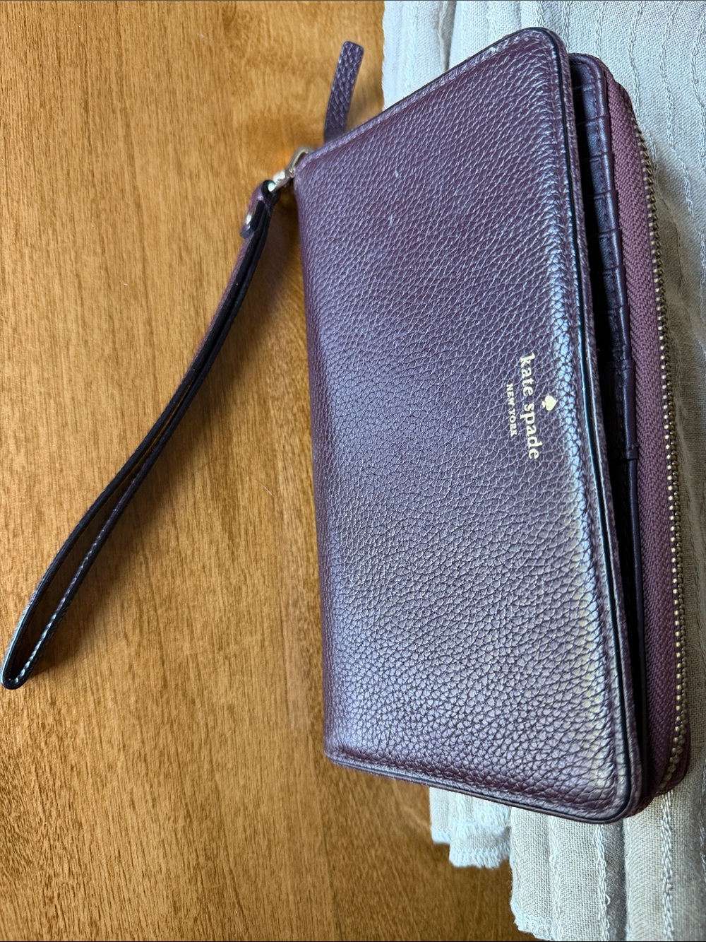 Deep burgundy brown Kate Spade wallet/clutch